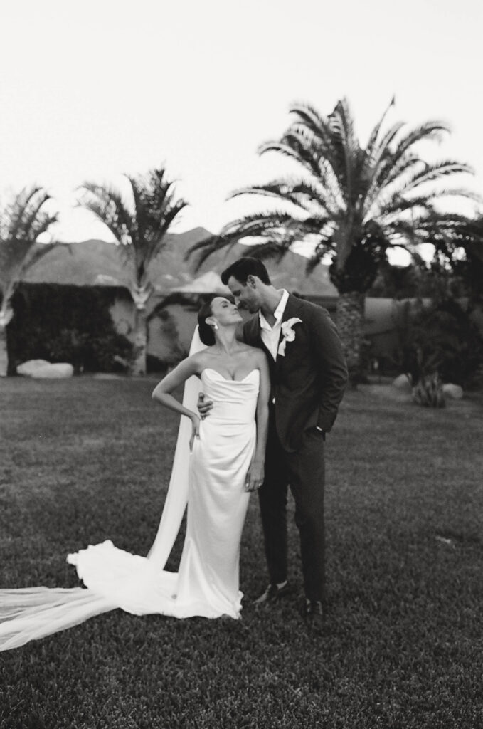 bride and groom kissing during their cabo wedding in baja luna