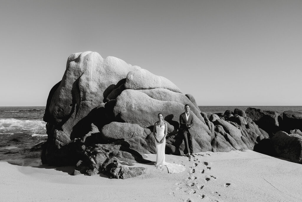 bride and groom at the beach in cabo during their destination wedding experience