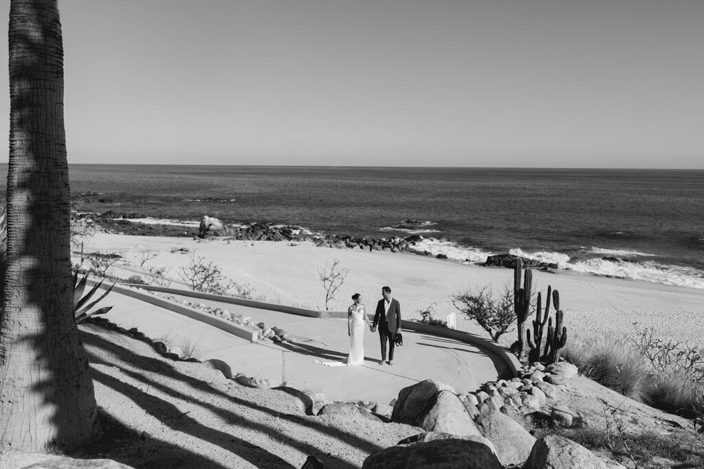 bride and groom at the beach in cabo during their destination wedding experience