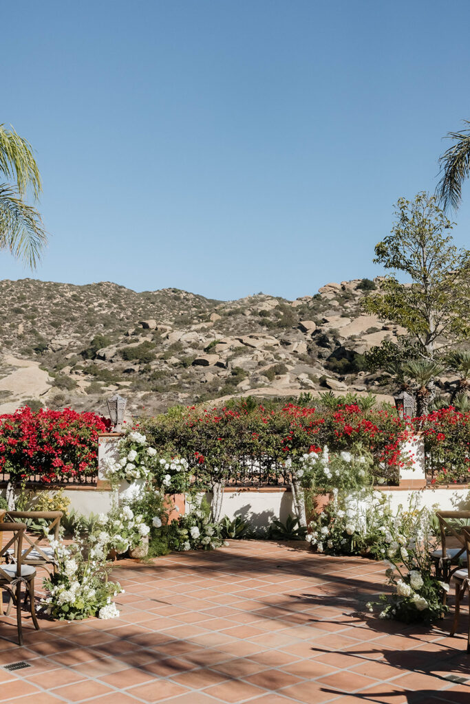 romantic and lush wedding ceremony set up at the Hummingbird nest ranch