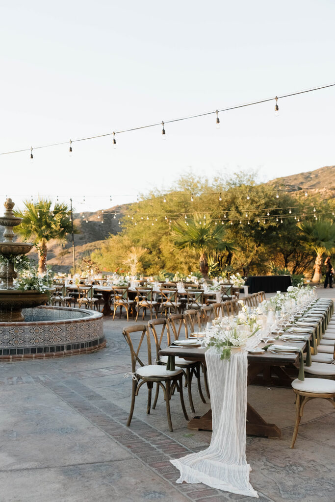 elegant and romantic hummingbird nest ranch outdoor wedding reception set up