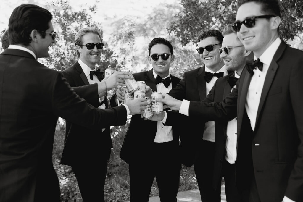 groom getting ready with his groomsmen
