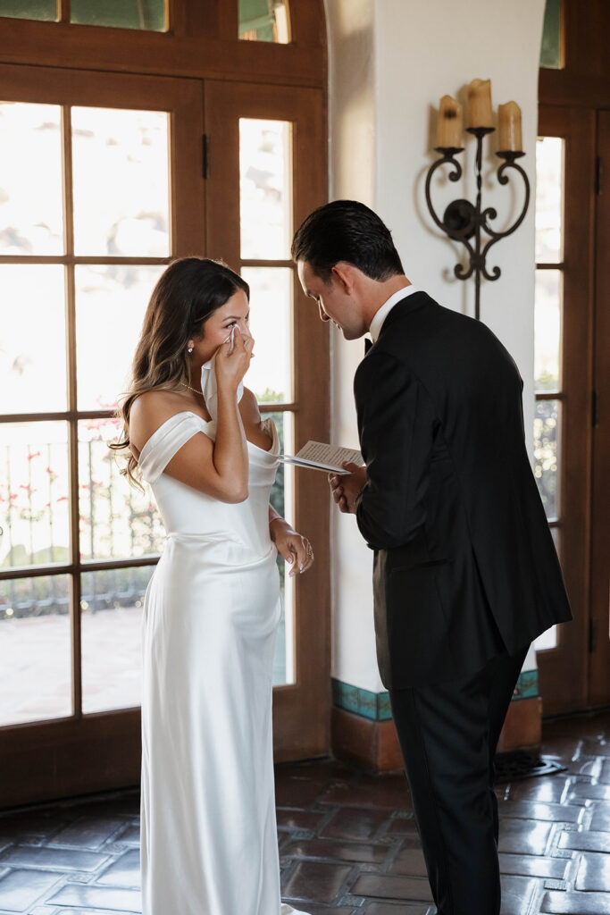 bride and groom exchanging private vows