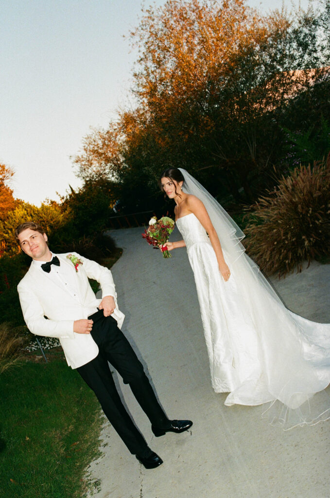 elegant bride and groom in the gardens at jeune perche, a european inspired wedding venue in california