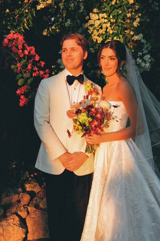 elegant bride and groom in the gardens at jeune perche, a european inspired wedding venue in california