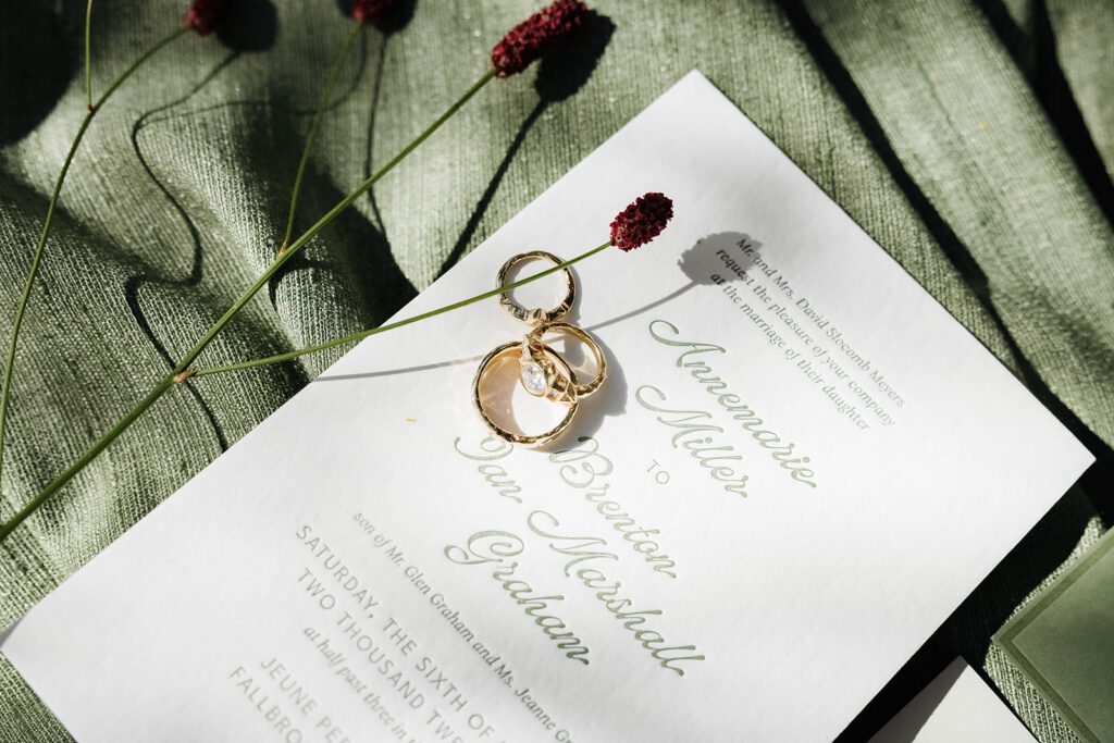 elegant white and green invitation suite