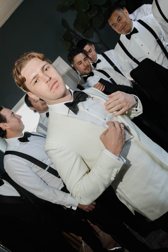 groom and groomsmen getting ready