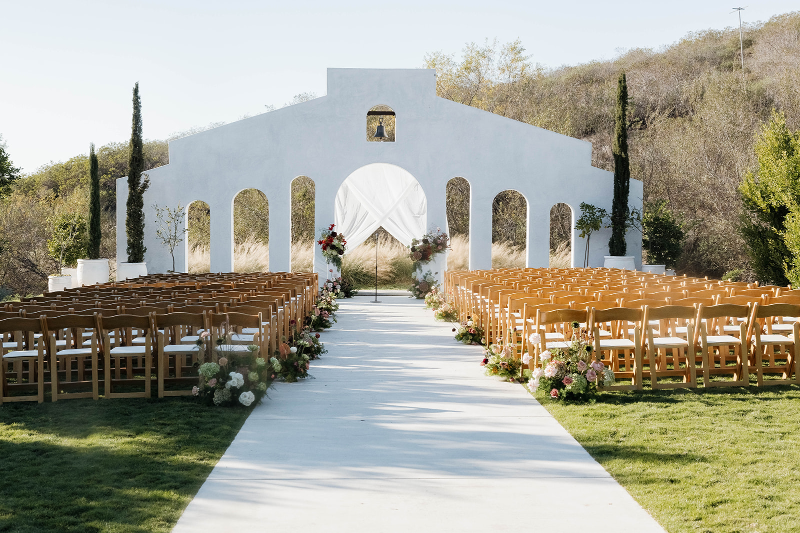 elegant outdoor wedding ceremony site at jeune perche estate in california