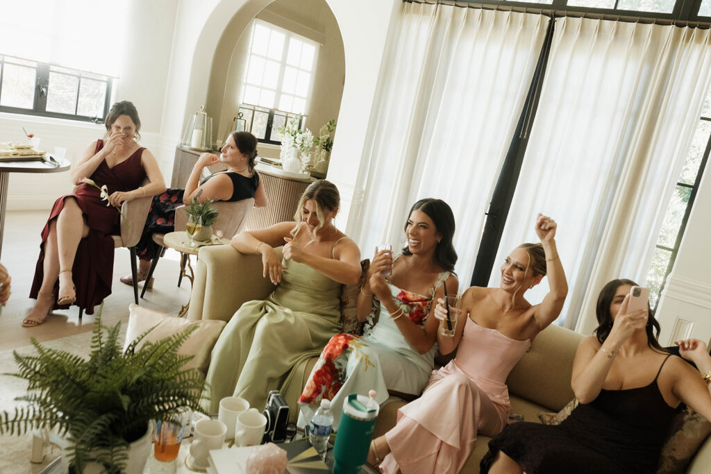 fun bride and bridesmaids during getting ready moments