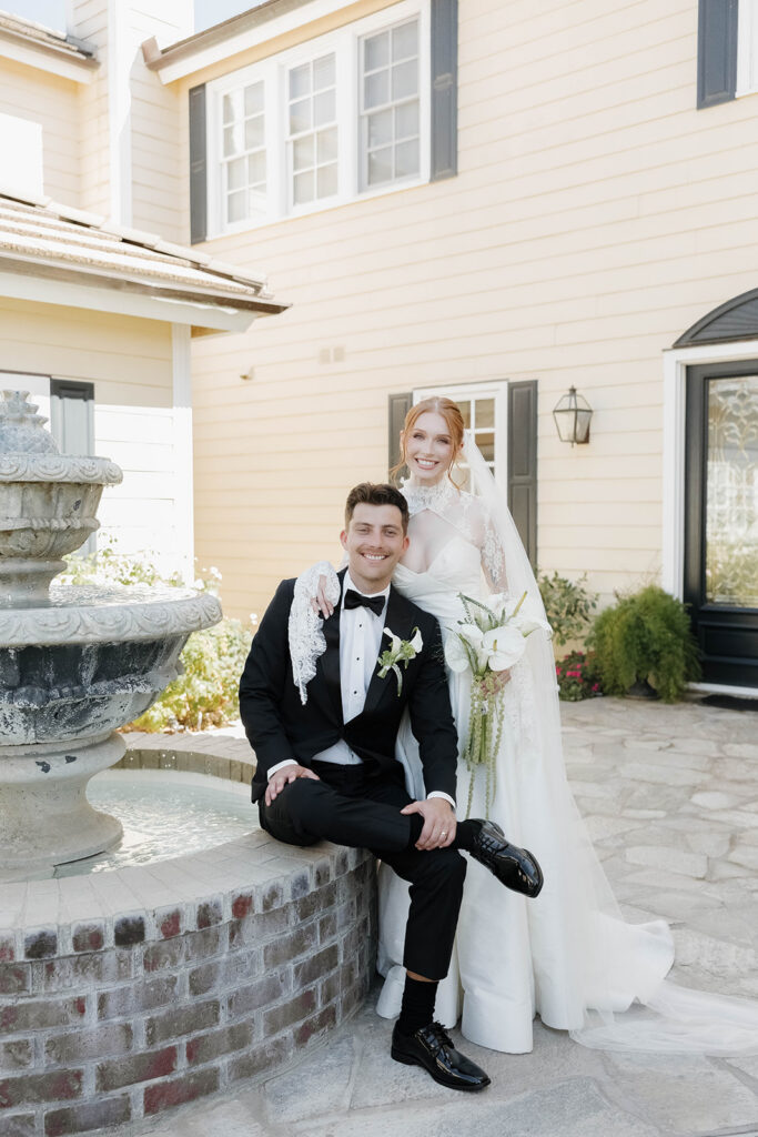 bride and groom in front of the Morgan Estate
