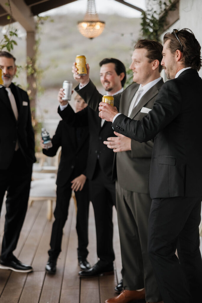 joyful groom and groomsmen