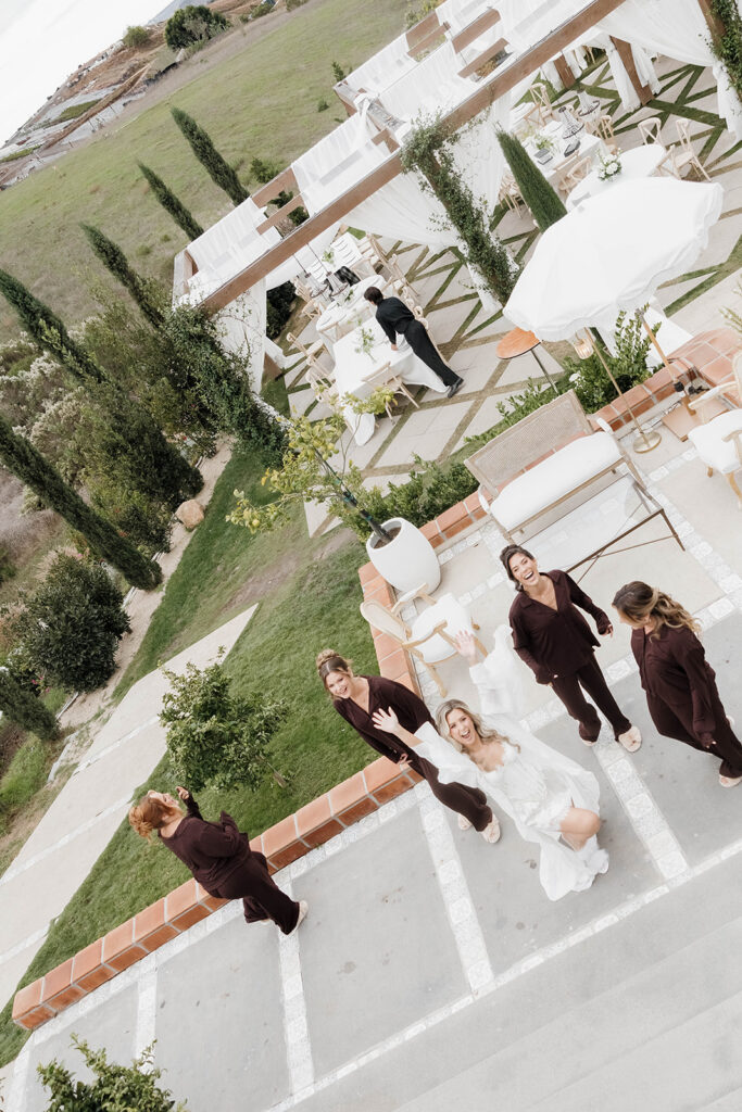 bride and bridesmaids in pjs outdoors