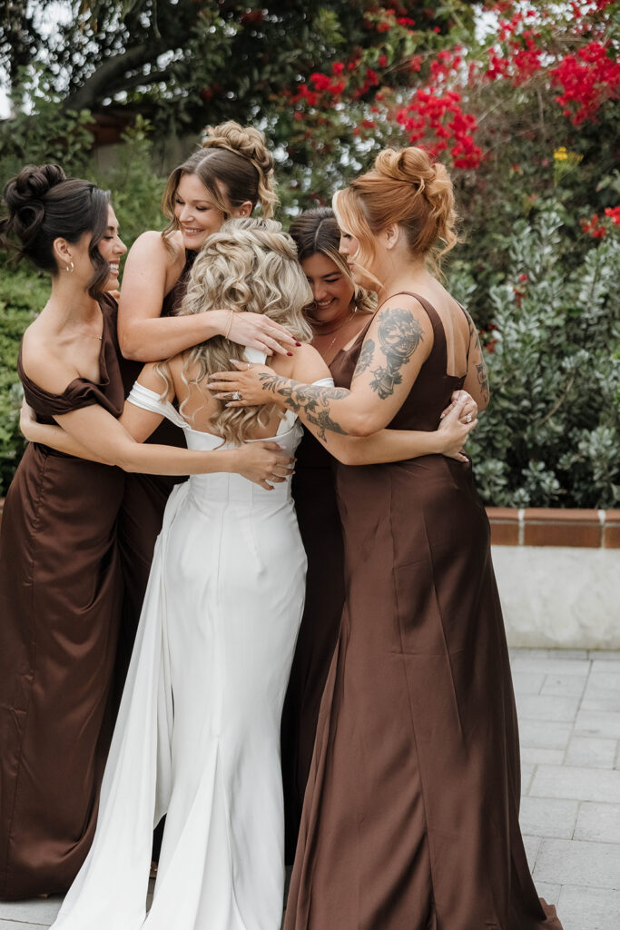 bride and bridesmaids first look