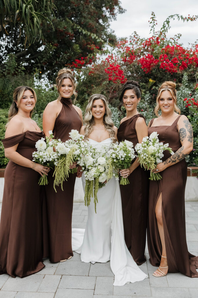 bride and bridesmaids all smiles at a california estate wedding at jeune perche