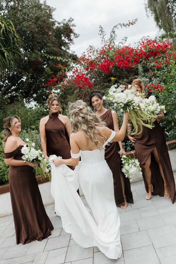 joyful bride and bridesmaids