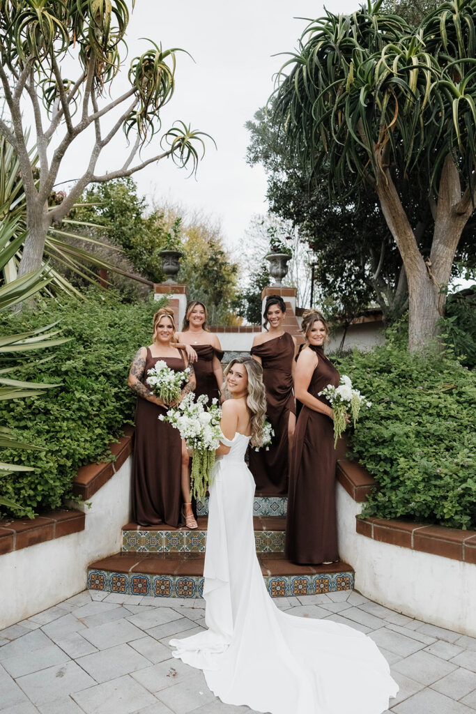 joyful bride and bridesmaids