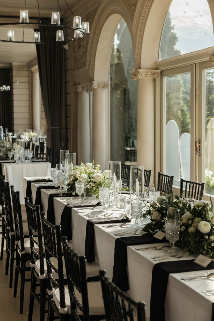 stone manor indoor wedding reception set up with elegant table designs