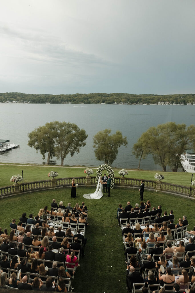 gorgeous outdoor wedding ceremony at Stone Manor in front of Lake Geneva