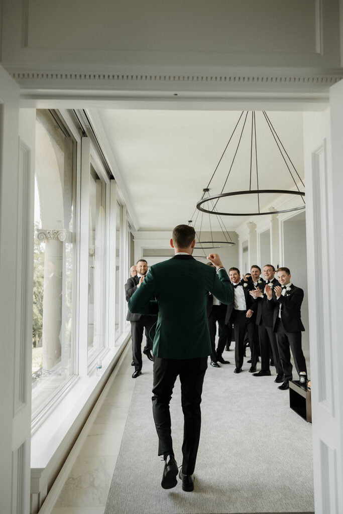 groom and groomsmen cheering