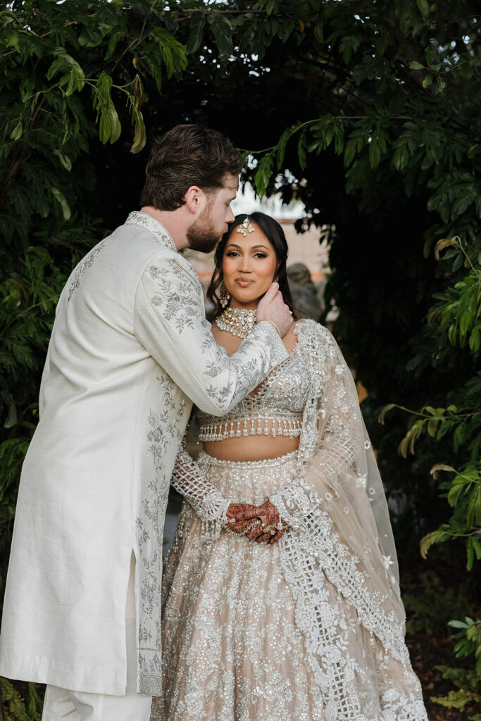 bride and groom in traditional indian wedding attire during their Multicultural Rancho Bernardo Inn Wedding Weekend