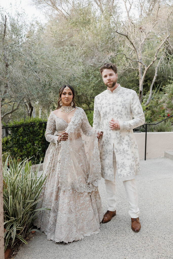 bride and groom in traditional indian wedding attire during their Multicultural Rancho Bernardo Inn Wedding Weekend
