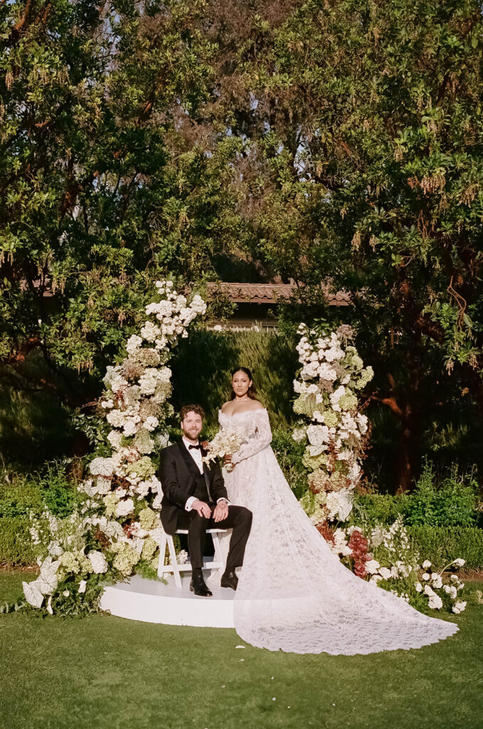 elegant wedding couple in the lush grounds of rancho bernardo inn