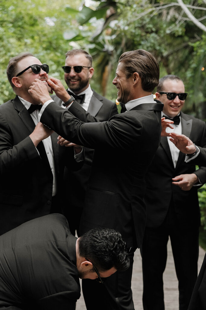 fun groom and groomsmen moment
