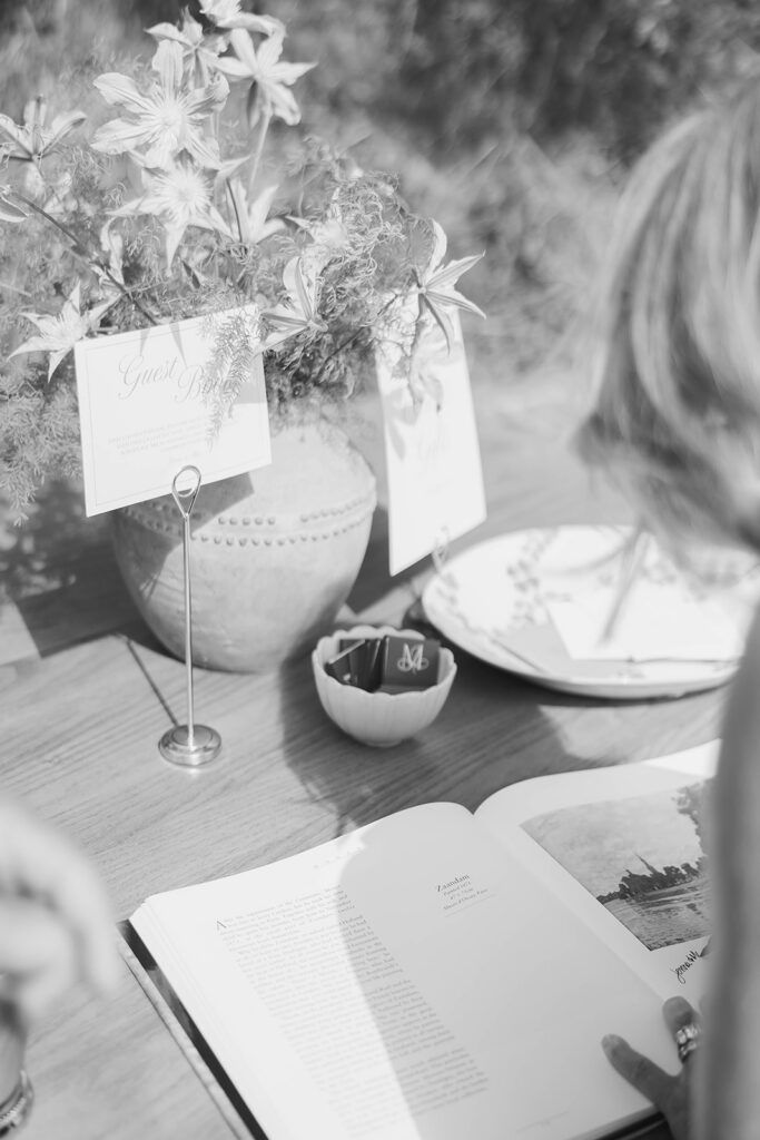 guests reading a guest book