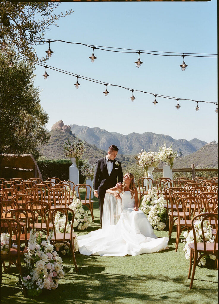 bride and groom at the ceremony spot in cielo farms